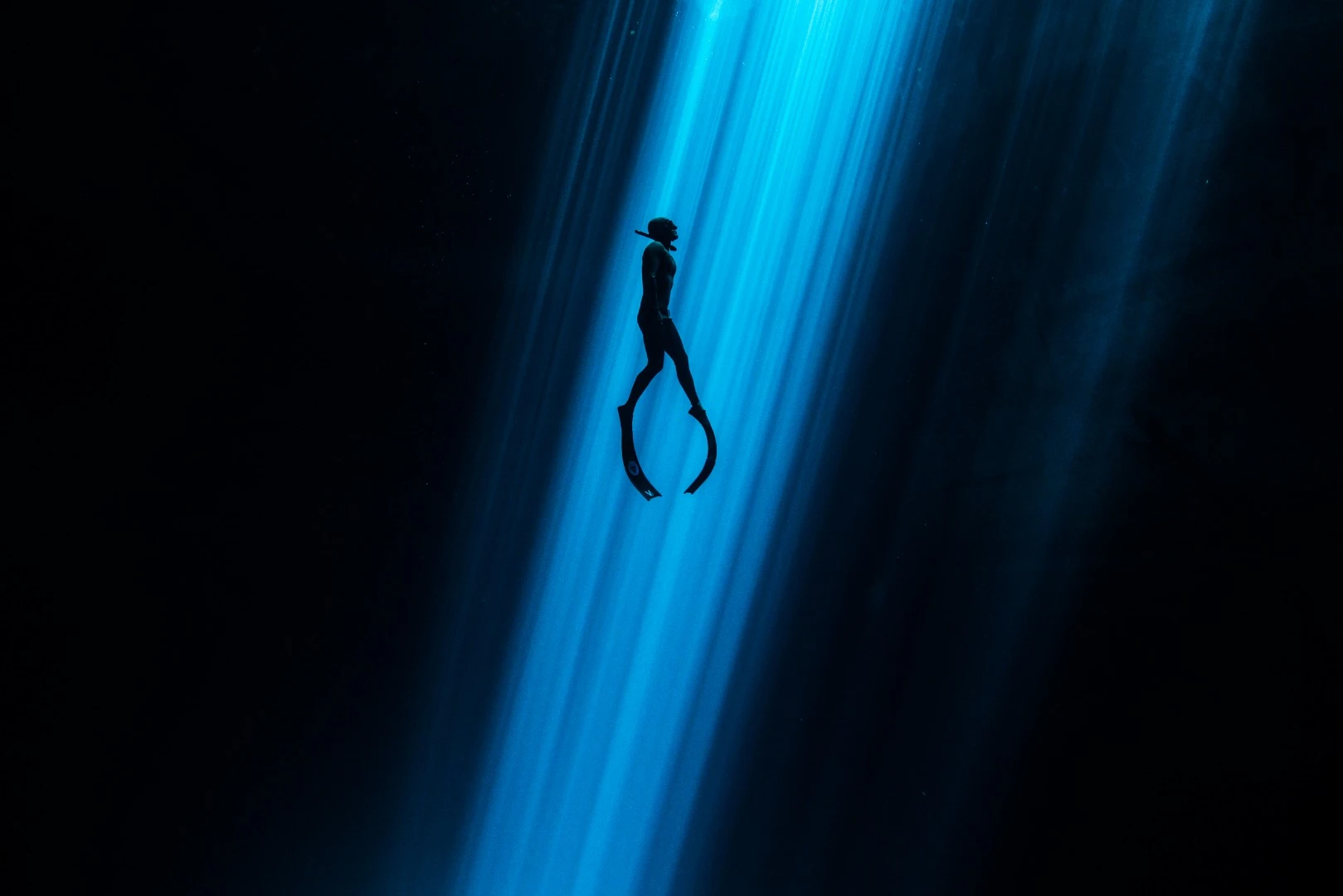 Honorable mention in the Underwater Art category. A freediver swimming in a Cenote in Merida, Mexico
