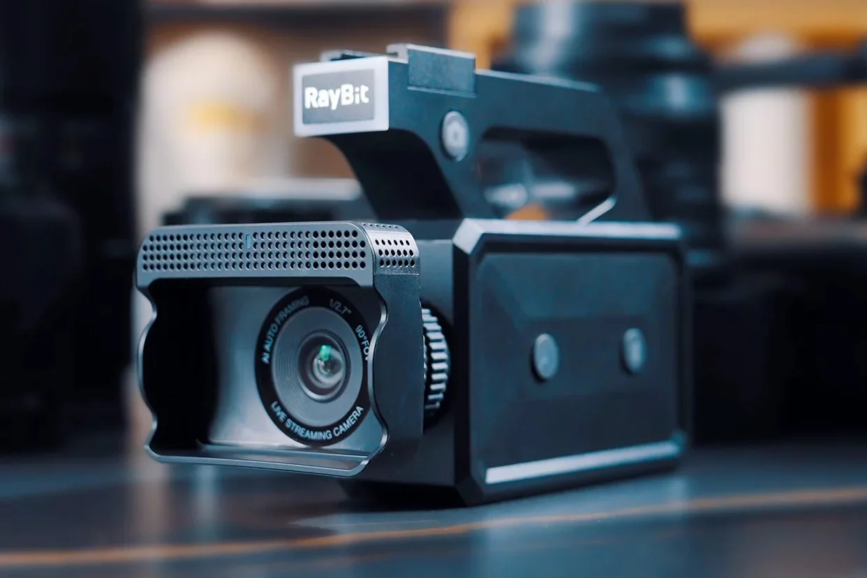The RayBit SC1 camera weighs 280 g (10 oz), has a 90-degree wide-angle lens, and can communicate with the app via either Bluetooth or Wi-Fi