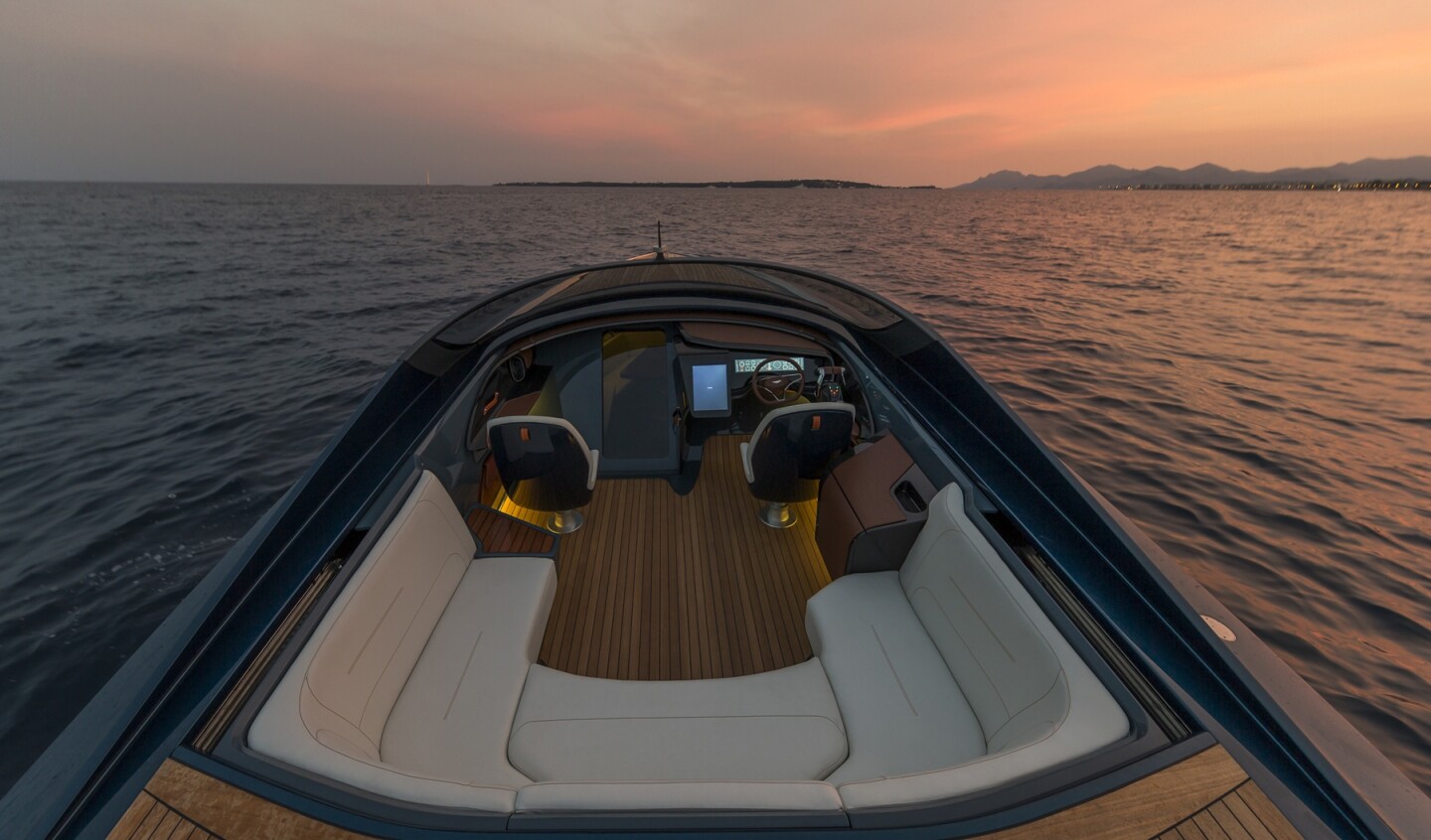 The cockpit boasts a carbon fiber dashboard, polished metal highlight features and leather rear seats that can accommodate up to eight passengers