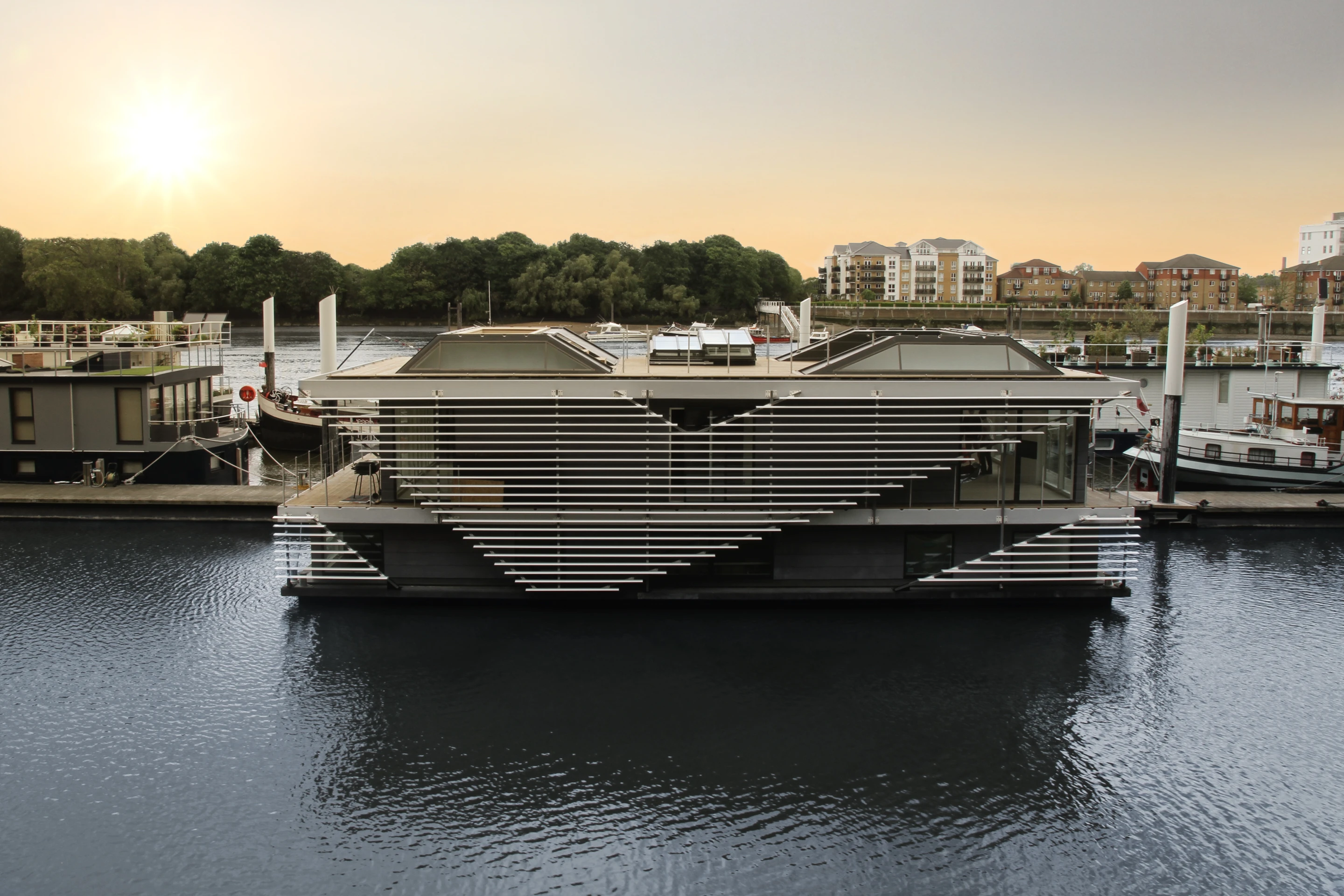 Inachus” is a two story house boat that more appropriately resembles a hi-tech floating mansion