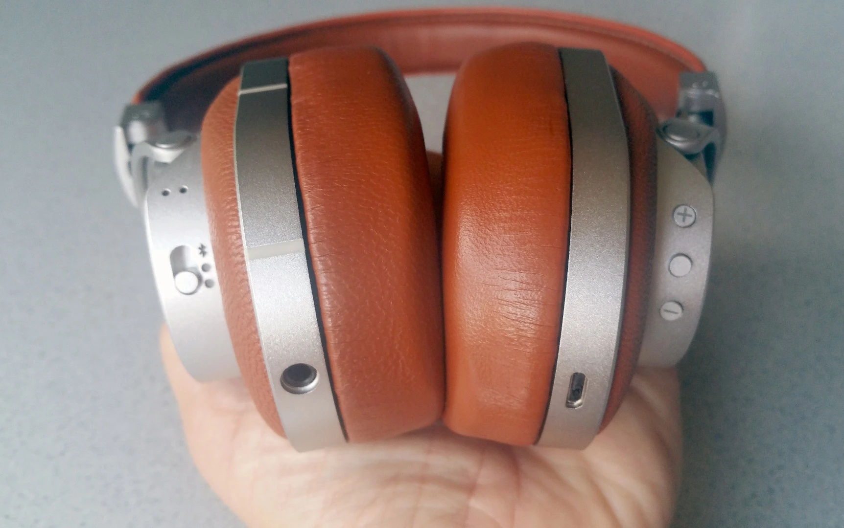 The Master & Dynamic MW60 headphones puts controls and connections within easy reach at the bottom of the cups