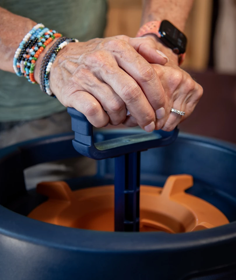 Pressurizing the Lifestraw Escape after pouring the untreated water in
