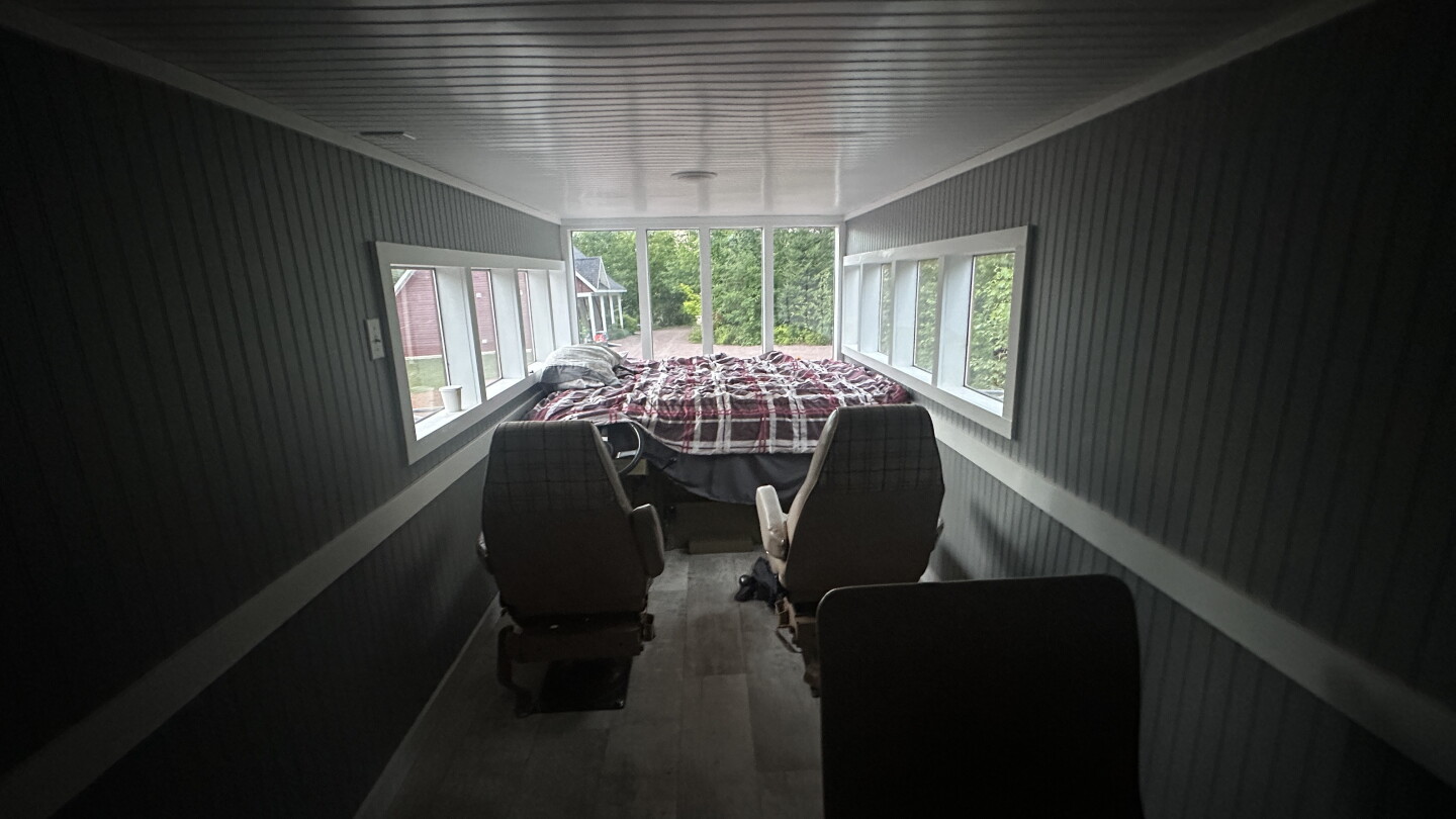 The Rubishack's passengers sit in seating sourced from an old 1970s campervan