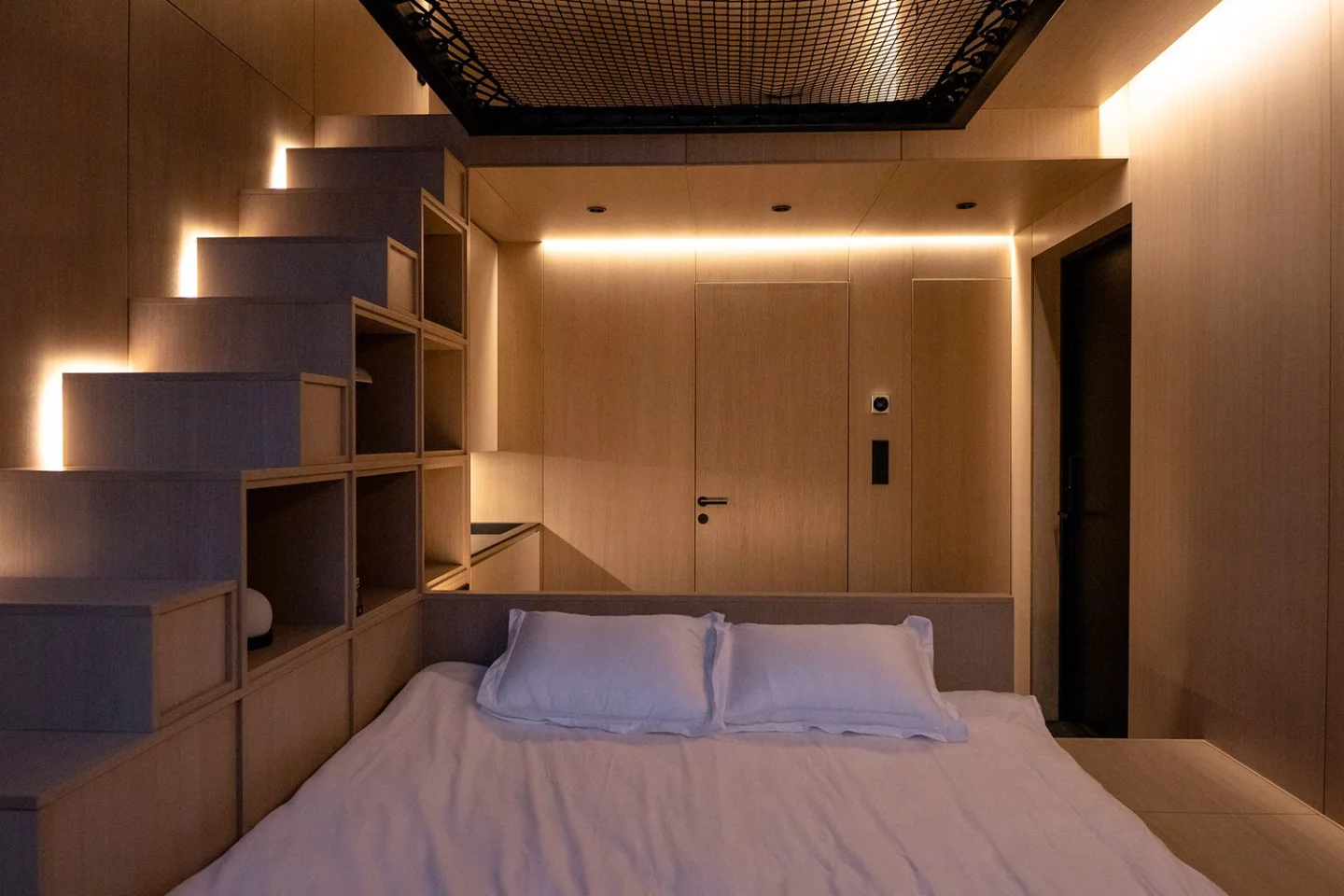The lighting design creates a warm and cosy environment at night