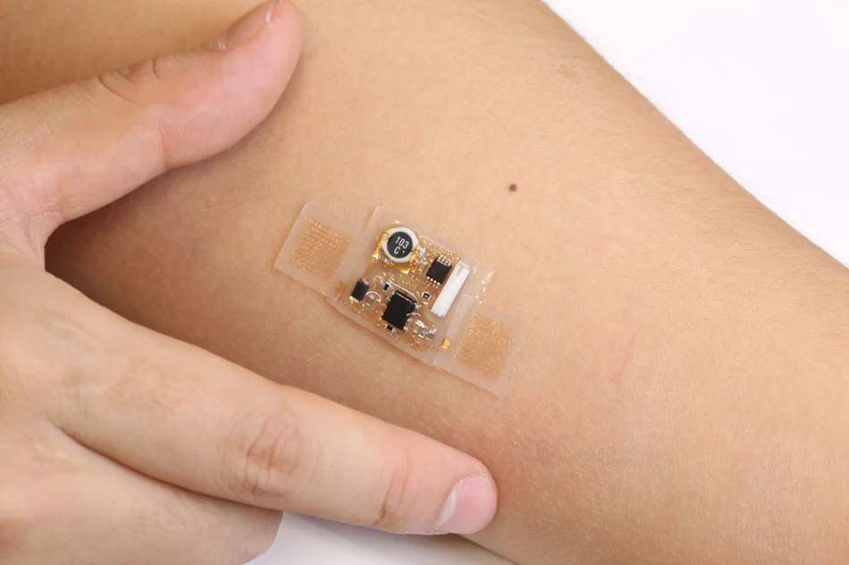 This flexible patch design makes it possible to create a range of bio-integrated devices (Photo: John A. Rogers)thin, soft stick-on patches that stretch and move with the skin and incorporate commercial, off-the-shelf chip-based electronics for sophisticated wireless health monitoring