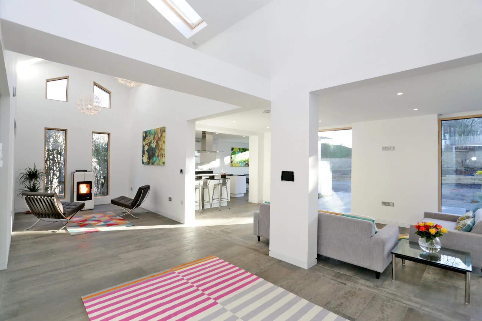 The Schoolmasters home features four bedrooms and three bathrooms, in addition to a lounge, kitchen, dining area, and office
