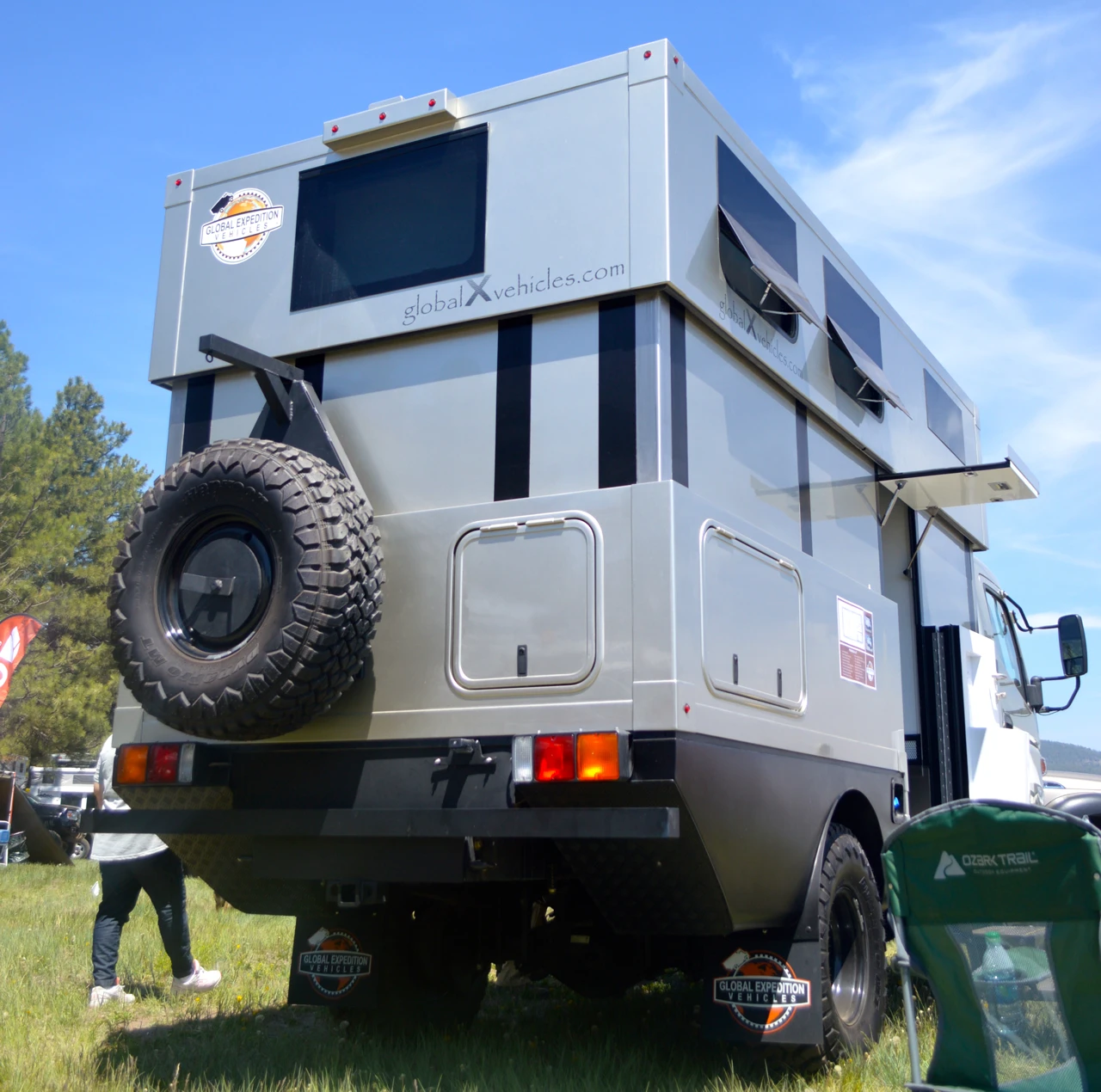 The Pangea LT's roof lowers to cab height, allowing it to ship to your overland destination of choice