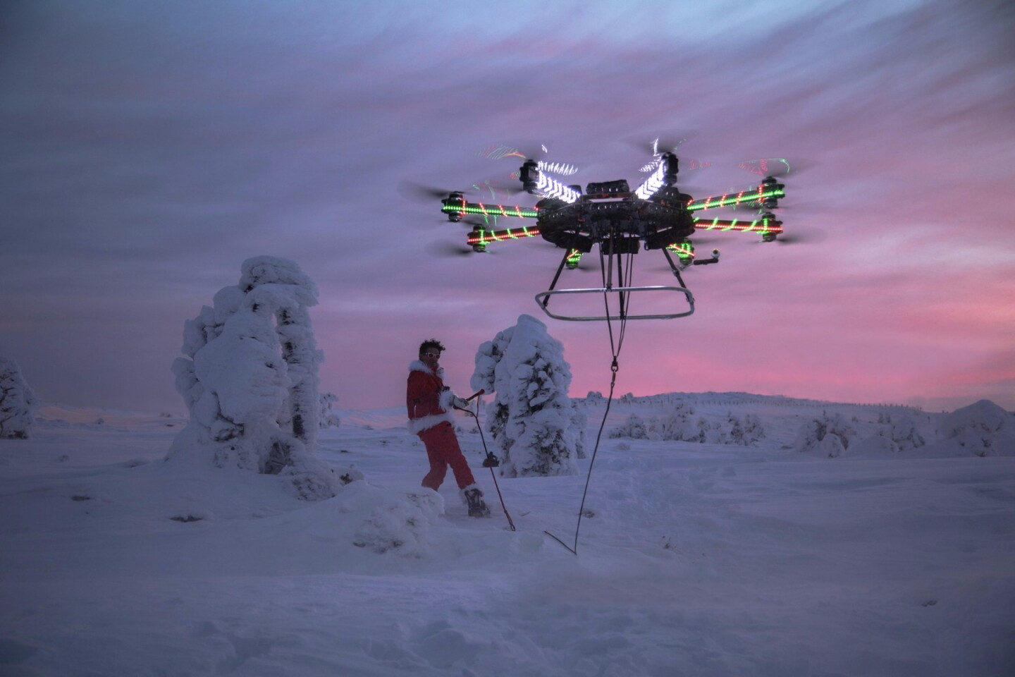 Drone pulls Santa snowboarder up the slopes, and into the air