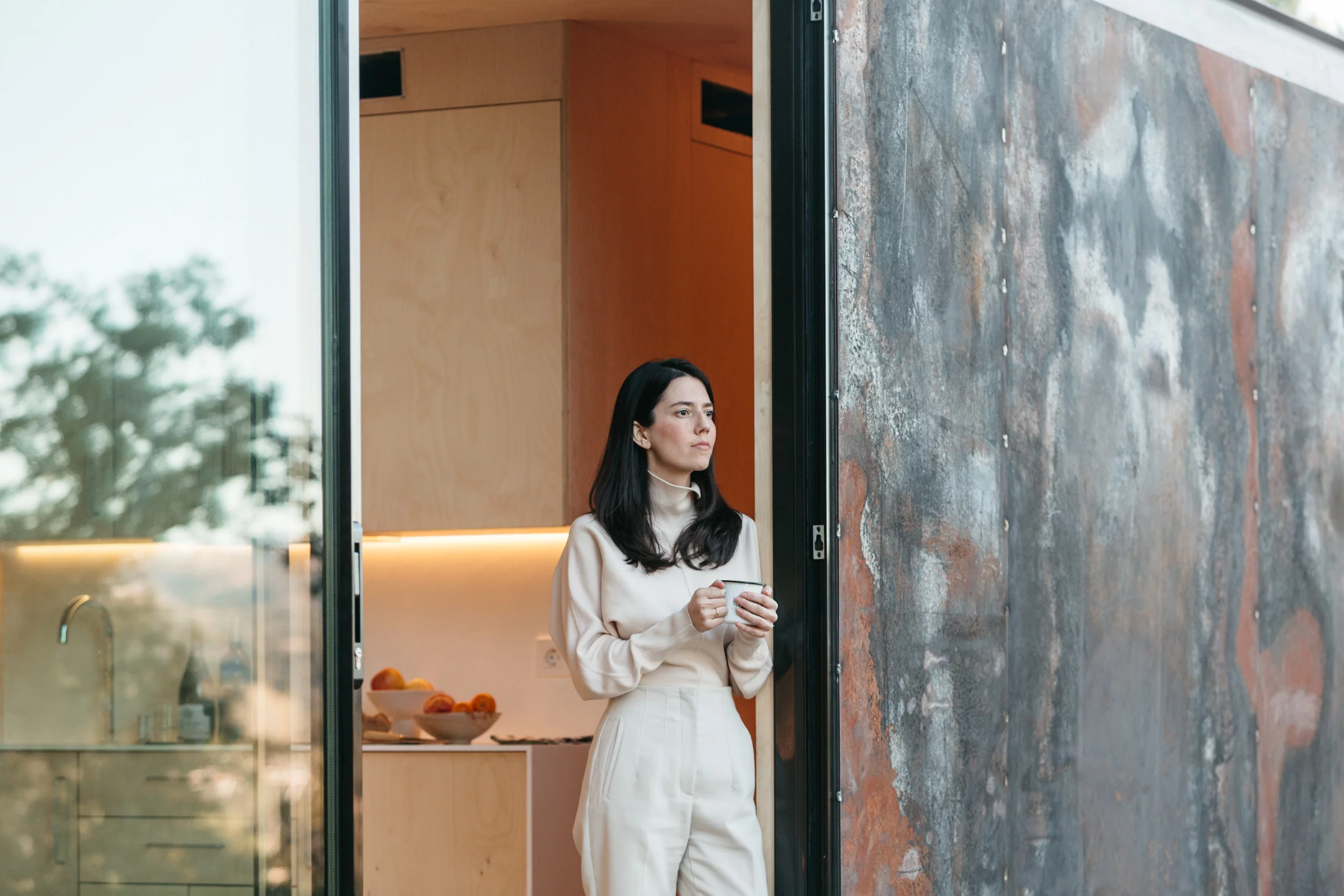 The Tini M's glazing slides open at several points, opening up the home to the outside