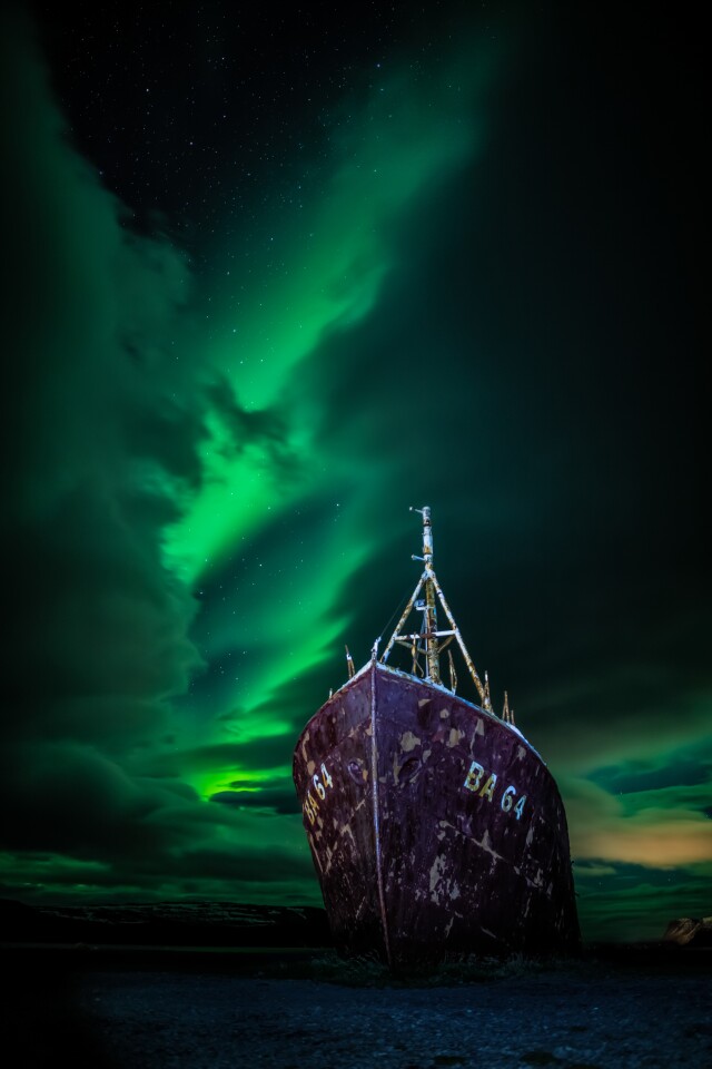 Aurorae. An Icelandic Saga. The Aurora Borealis above the wreck of the Gardur in the Westfjords region of Iceland. Taken with Canon 6D Mark II camera, 24mm f/2, ISO 400, 10-second exposure