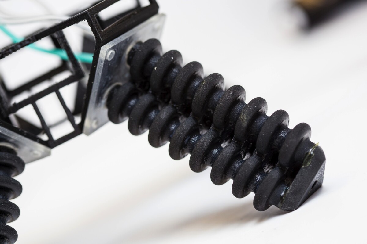 A close-up of the robot's soft pneumatic legs