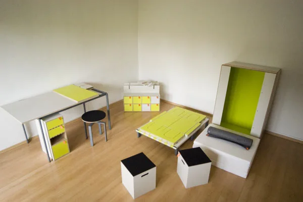Casulo contains an armoire cupboard, desk table and cabinet, height-adjustable revolving chair, two stools and a bed with mattress