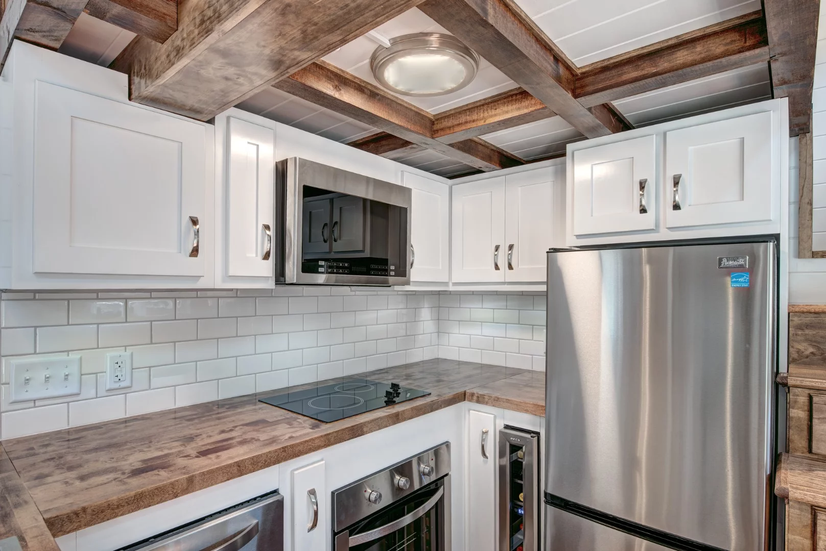 Kitchen inside the Journey tiny house, by Alabama Tiny Homes