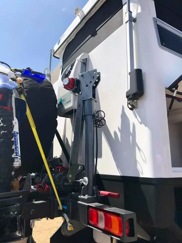 EarthCruiser offers a multi-use crane for helping load things up