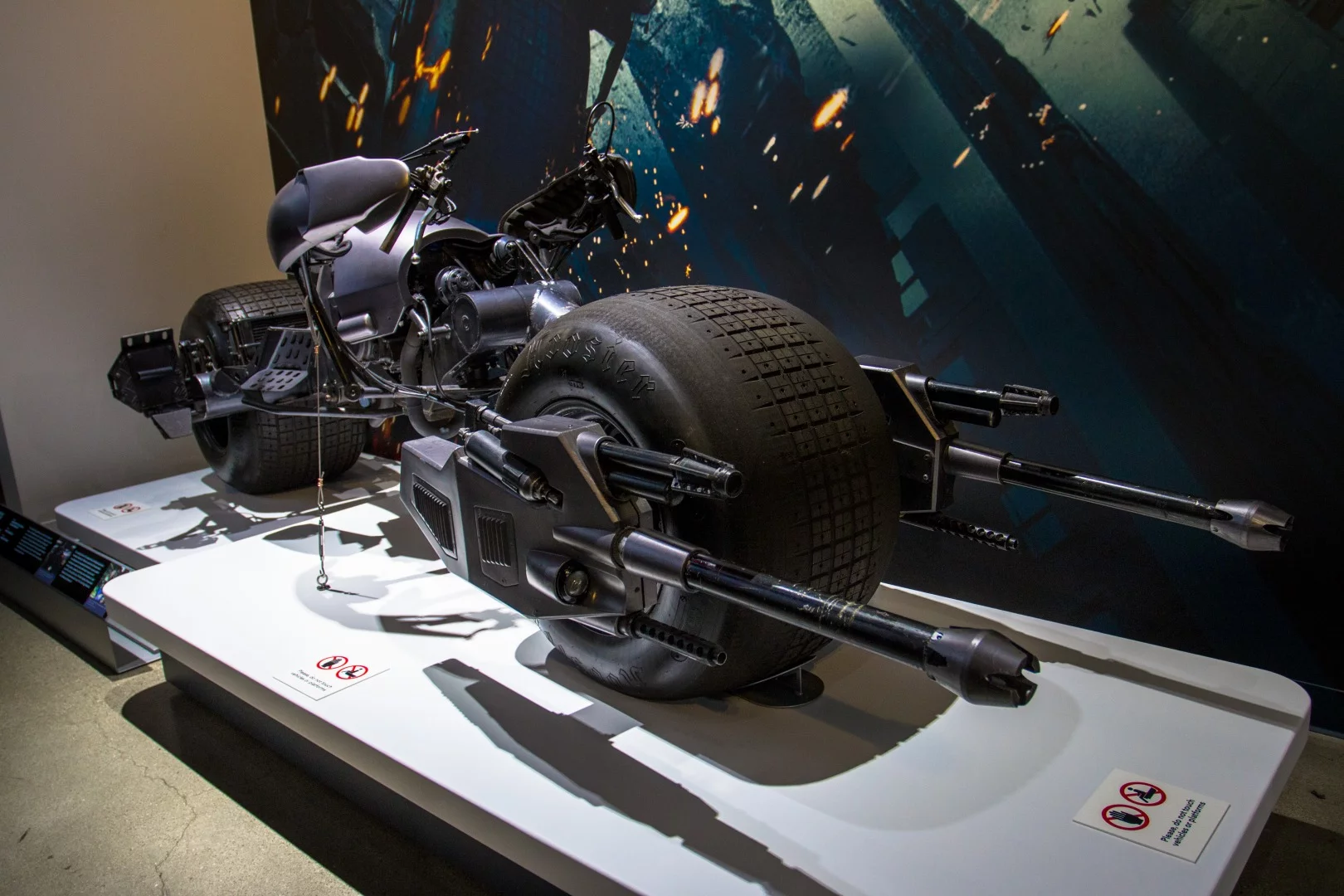 When the Nolan-era Batman's giant armored Tumbler vehicle gets pinned down in The Dark Knight, an eject sequence initiates that splits out this super-cool Batpod motorcycle for Christian Bale to blast around town on.