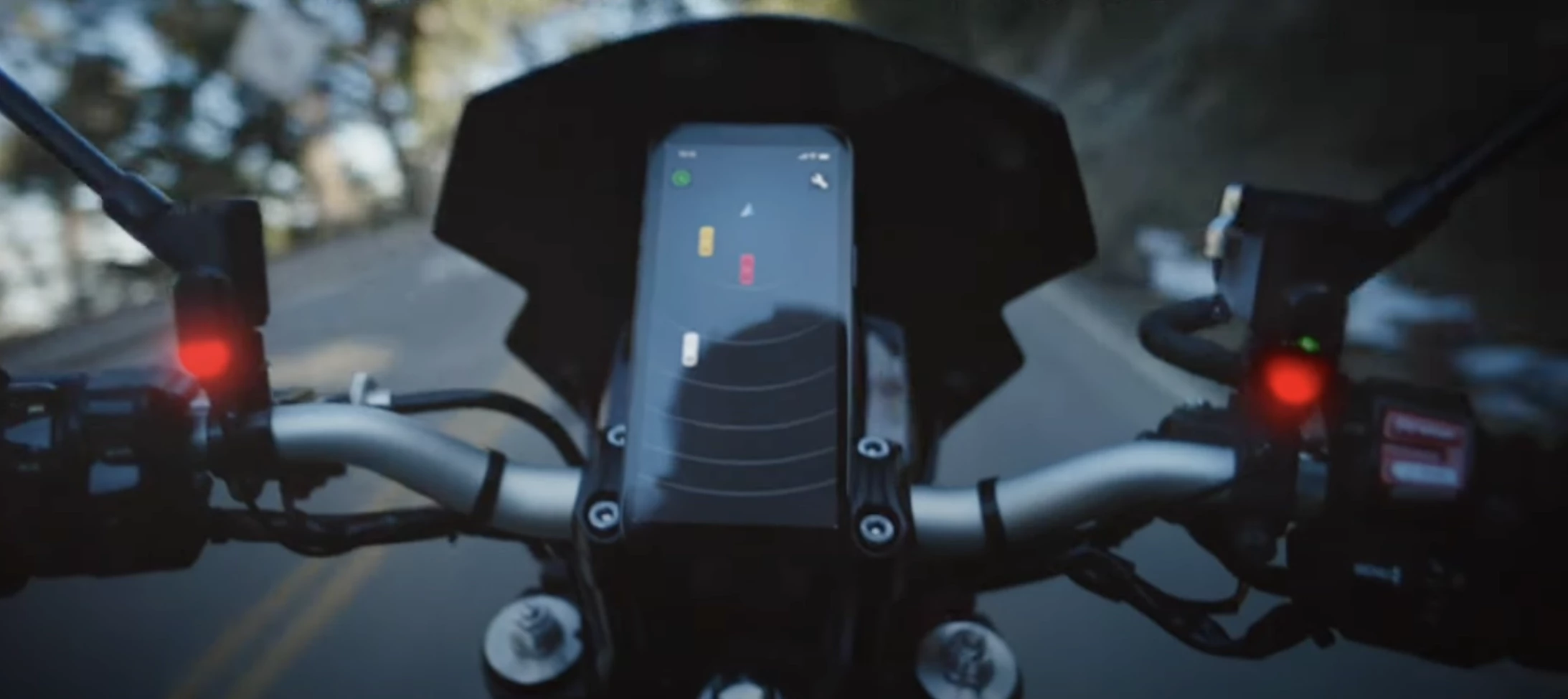 With a smartphone on the handlebars, you can now see robo-vision of what's behind you - but apparently, not your dash or speedometer in this case!
