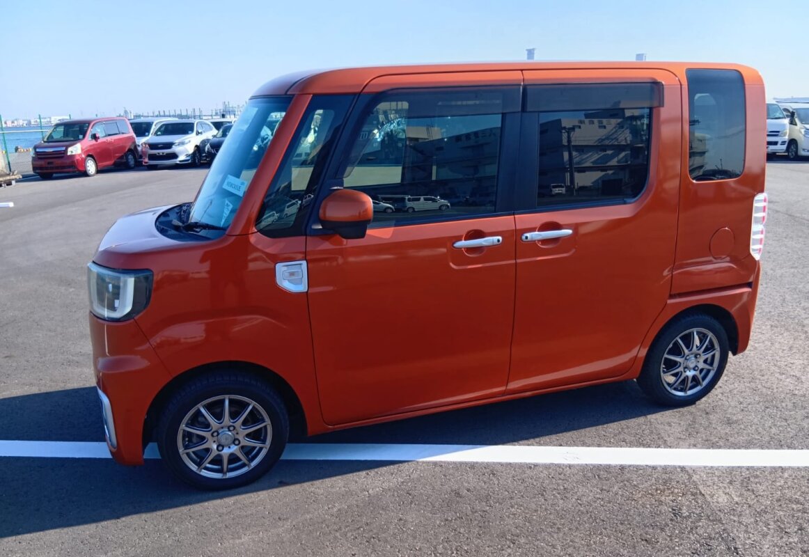 Crazy-cheap Toyota micro-camper van escapes Japan to travel west