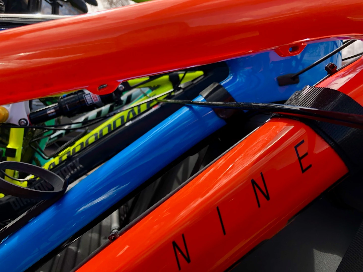 The Latchit Rack utilizes a velcro strap to secure the bike's frame, and a rubber strap to secure its front wheel