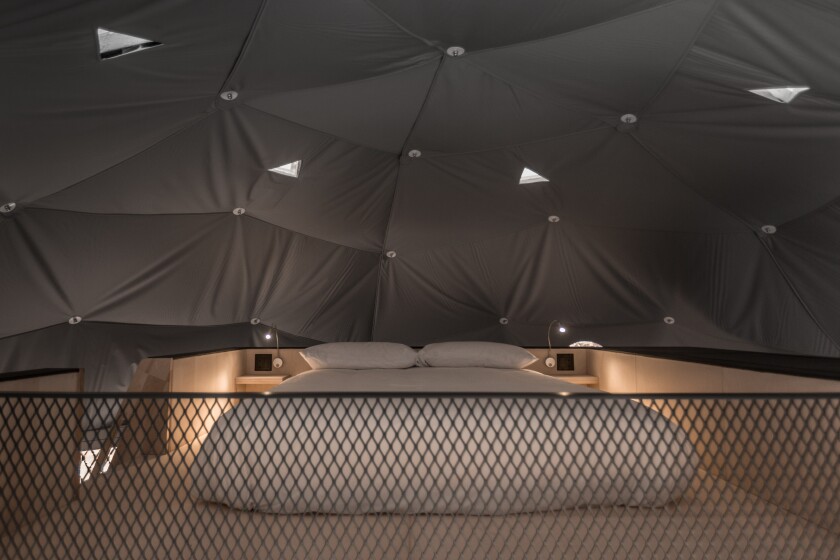 The elevated second sleeping quarters with full queen size bed