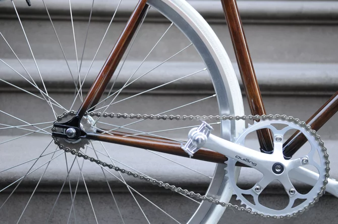 New Zealand's Rob Pollock hand-paints clients' bicycle frames with a faux woodgrain finish