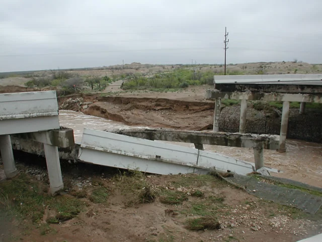 Bridge collapse due to scour and erosion