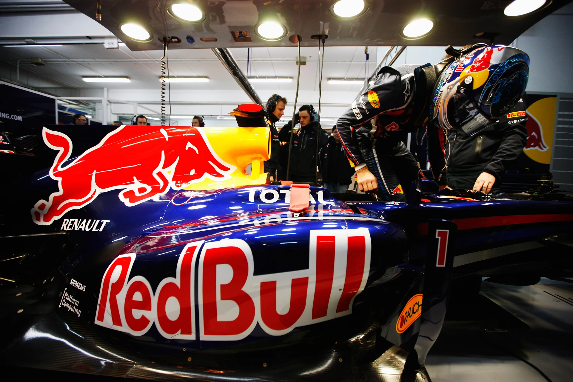 Focused activity in the Red Bull garage