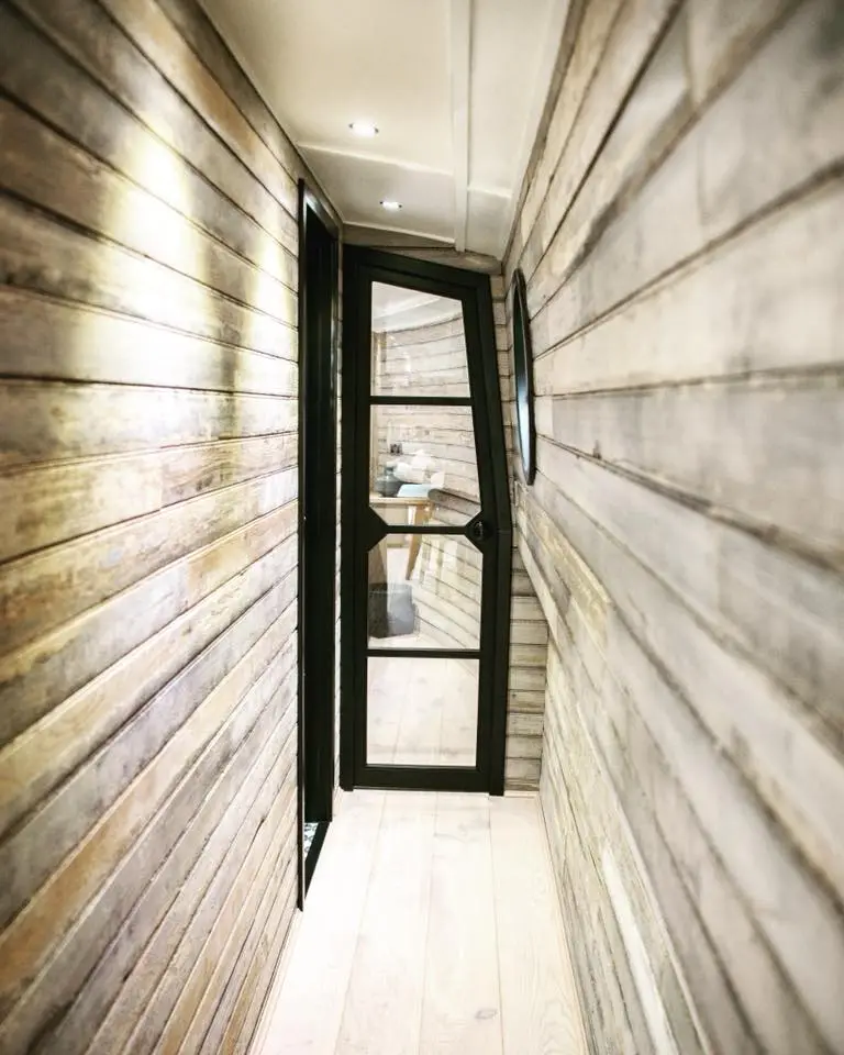 Reclaimed wood was used throughout the vessel for the interior panelling, giving the boat its rustic feel