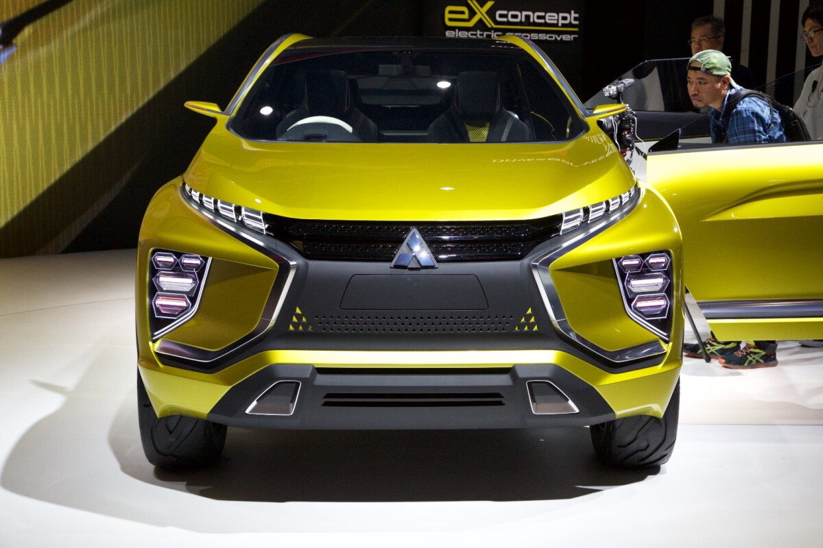 The front fascia includes a lack of grille work, hinting at the EV technology within