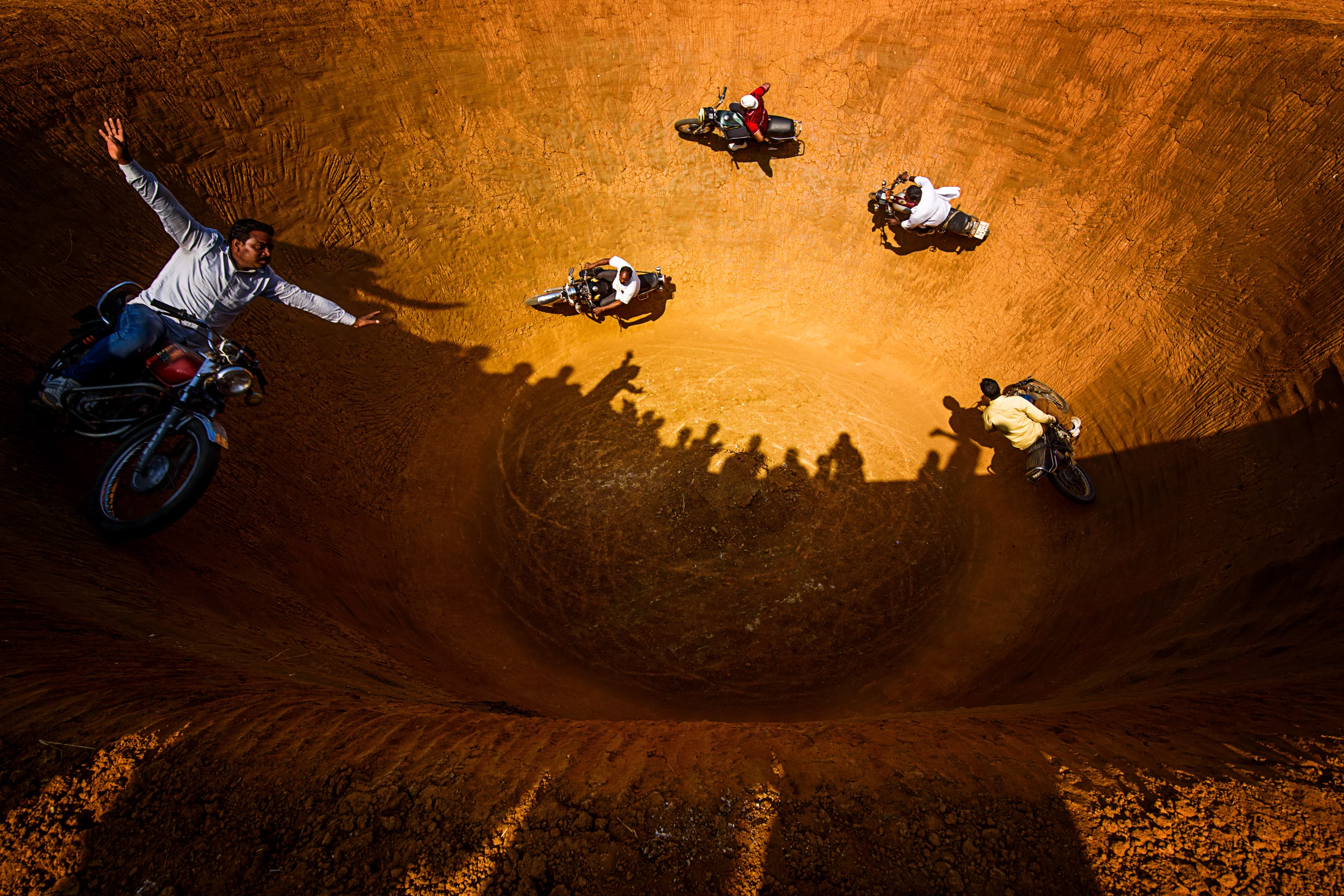 Finalist, People. "Death of Well". The "wall of death" or "well of death" is a common game now at fairs and carnivals in India, though it first originated in America. Motorcyclists circle the well again and again