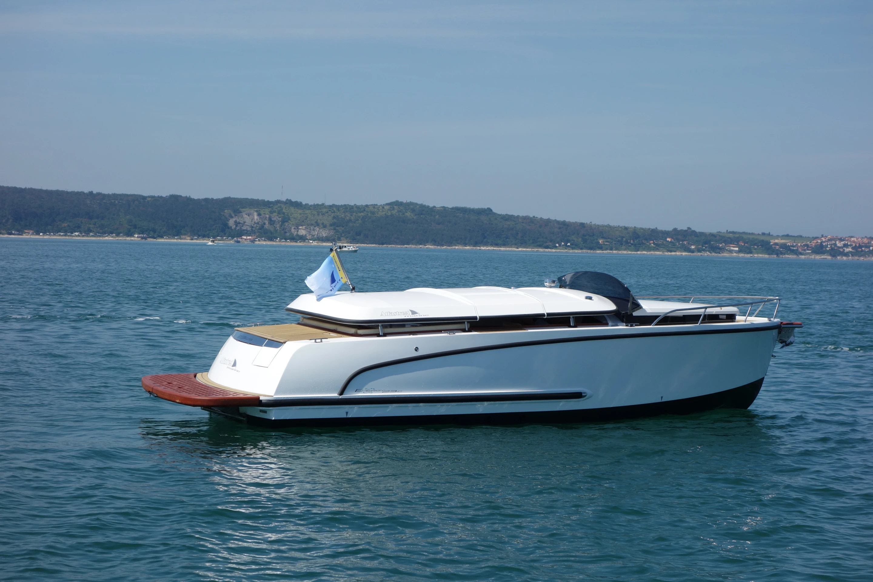 The Alfastreet 23cs's hard top automatically lowers, acting as an integrated cover