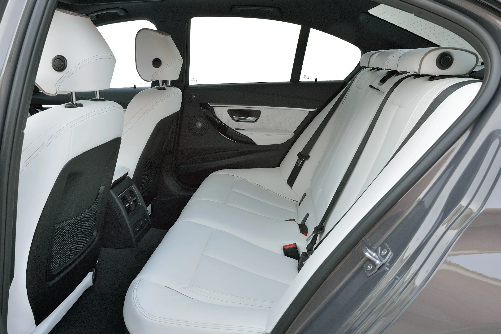 If you've got kids sitting back here, white leather might not be the most practical choice