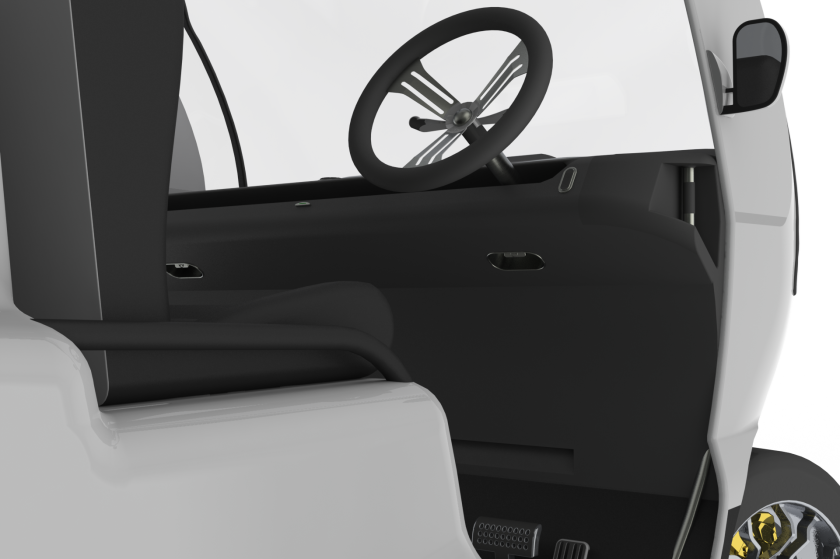 The driver can reposition the steering wheel on either the left or right of the Bug-E by sliding it along a track in the dashboard