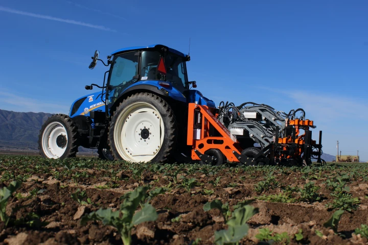 Although FarmWise previously developed a fully autonomous self-driving weed-pulling machine called the Titan, the Vulcan is towed behind a human-driven tractor