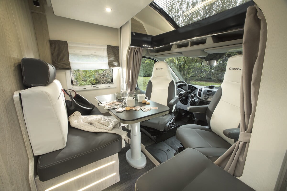 The front dinette includes seating for five