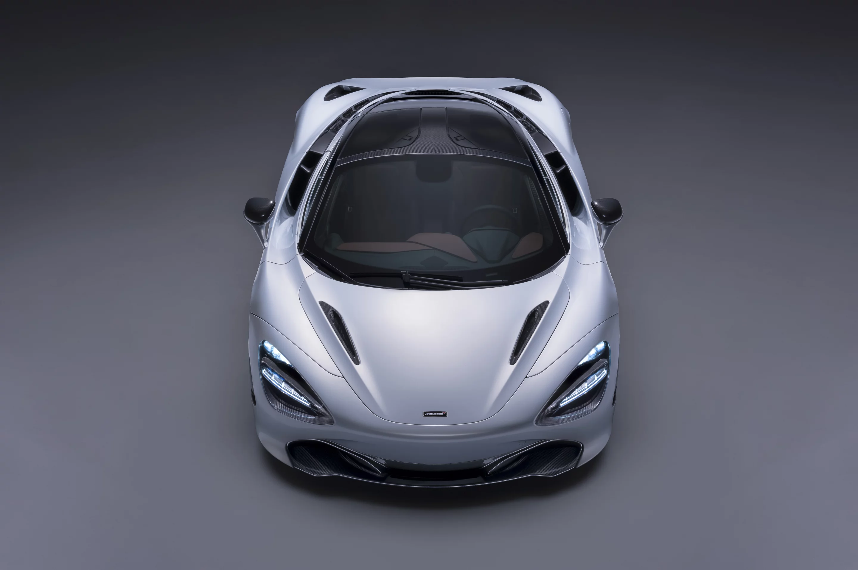 Air flows under the skin of the 720S to keep the flanks clean of ducts and scoops