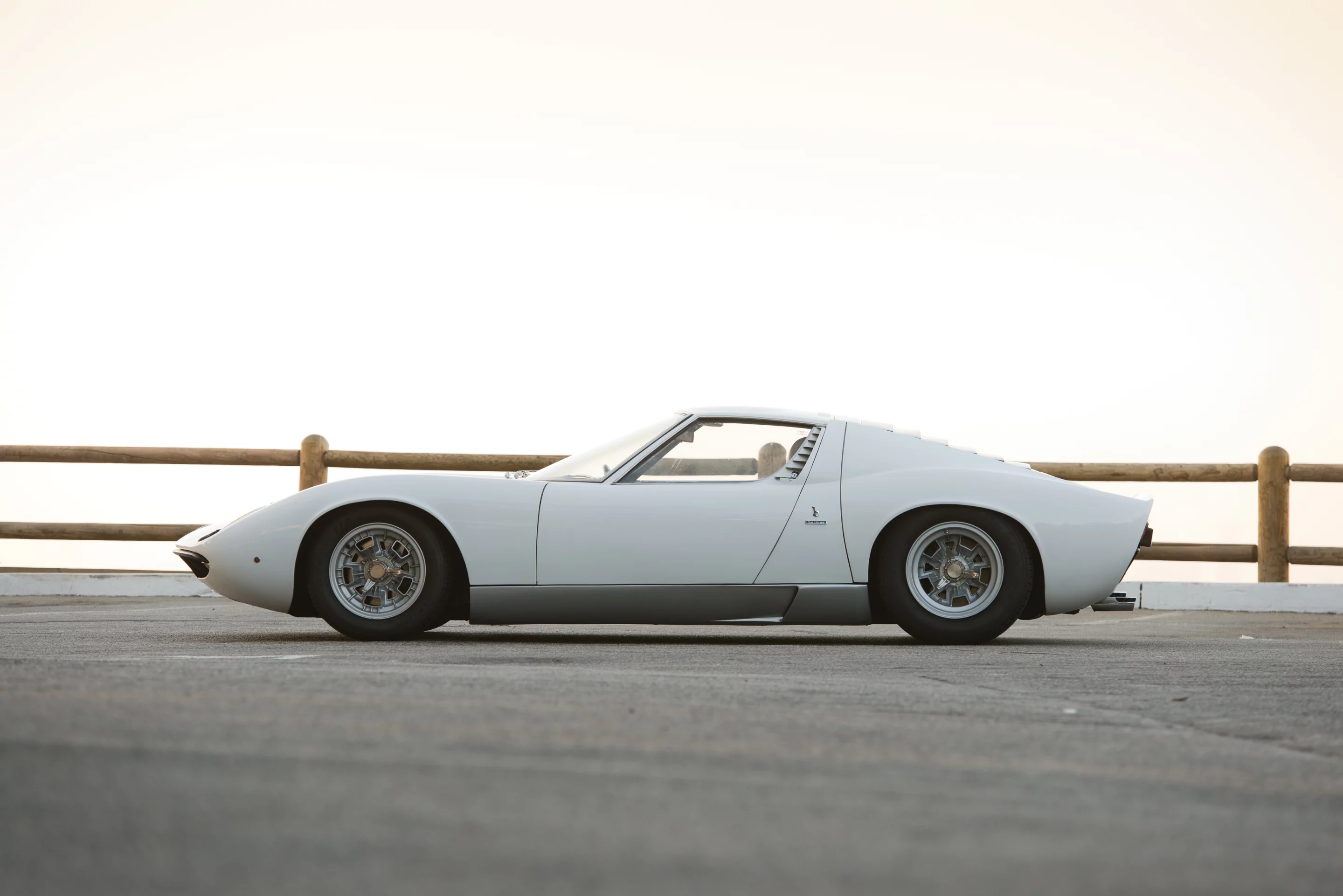 1969 Lamborghini Miura P400 S by Bertone. Auctioneer's Estimate: US$1,000,000 - US$1,400,000. Prior to the arrival of the Miura in 1967, many sports cars certainly offered high levels of performance and handling. The Miura, however, was the first to be built around the criteria that defined our modern concept of the supercar: tremendous speed and jaw-dropping design coupled with technical innovation, resulting in a wallet-wilting price tag to which only the wealthiest could aspire.A desirable early P400 S in wonderful colors, restored by marque specialists.Official Auction Description and Images