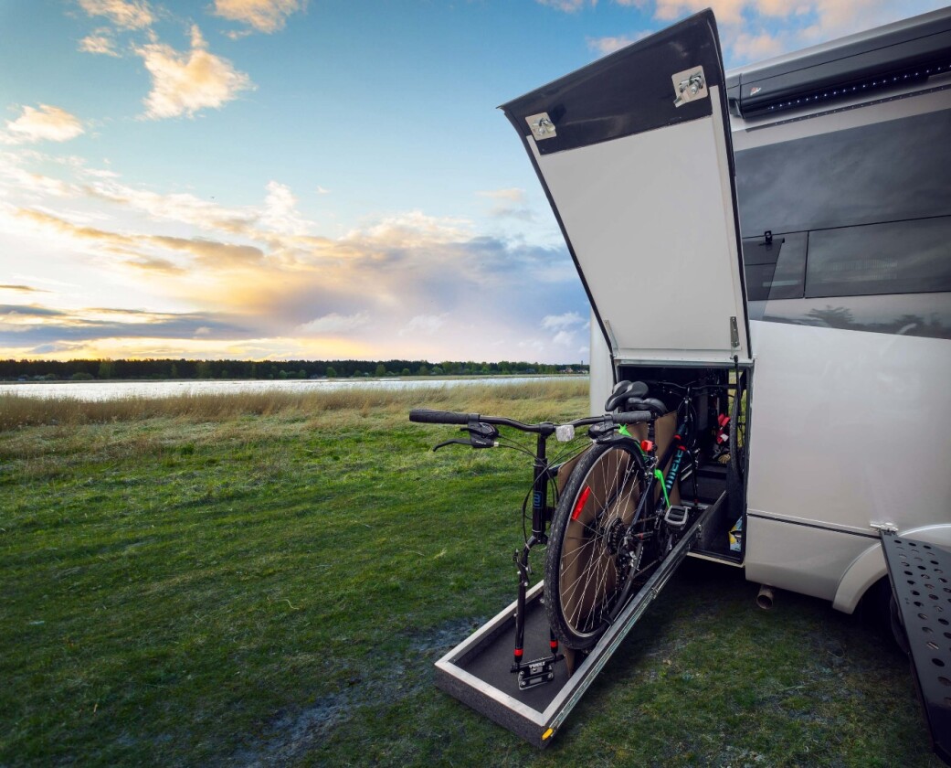 The pass-through garage stores two bicycles and other gear