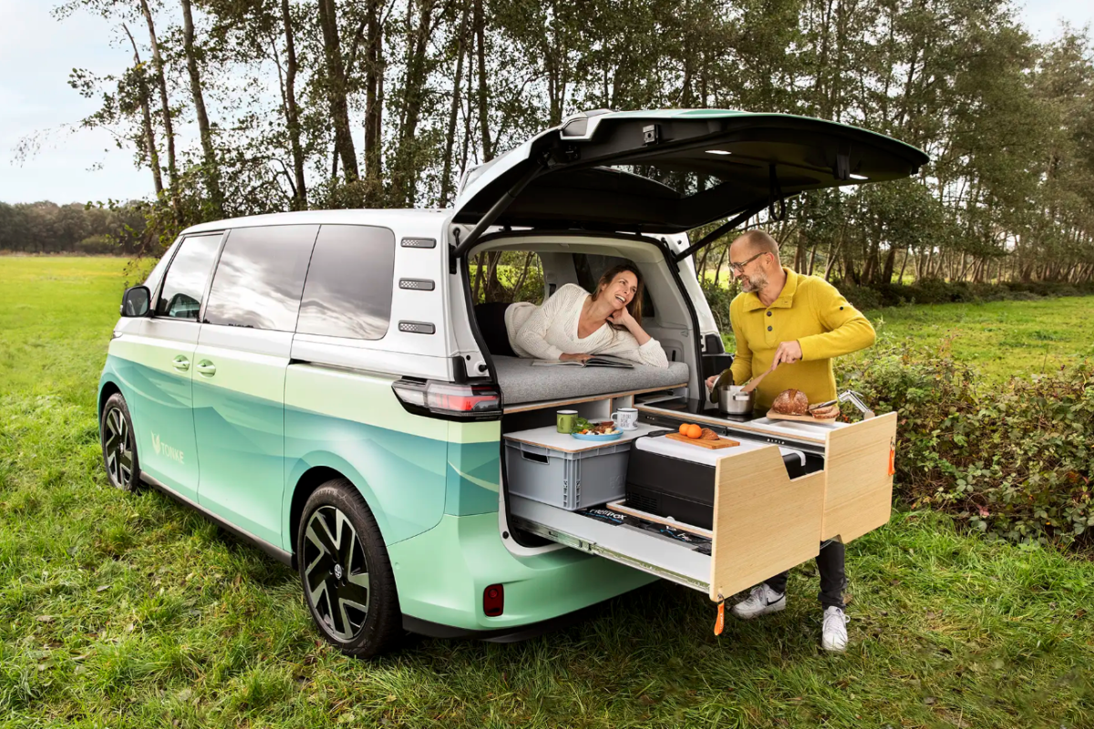 Tiny VW ID. Buzz e-camper lives large with queen bed and flex kitchen