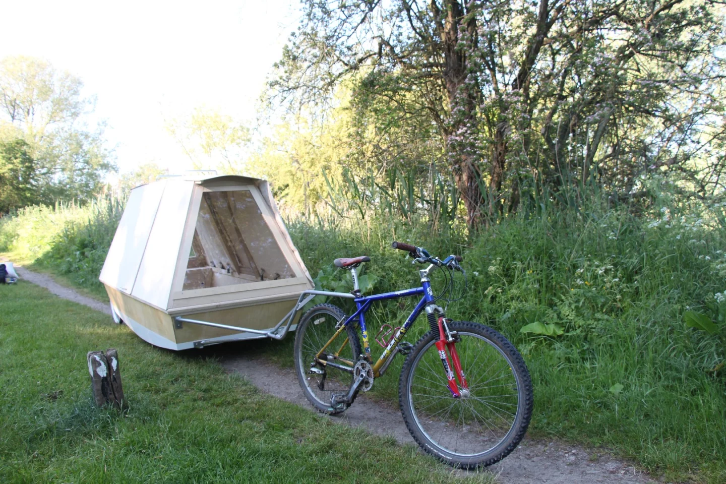 The floating shelter is relatively easy to tow on the back of a bicycle, with a simple clip on attachment and your off
