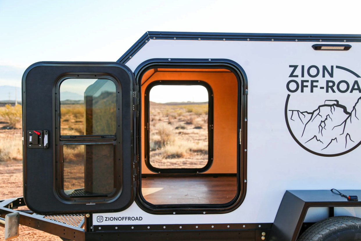 The $12,500 Zion base trailer includes two side doors, but the mattress is sold separately