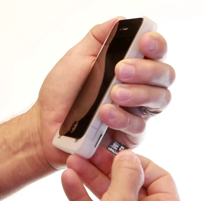 The microSD card slides into a port on the side of the device