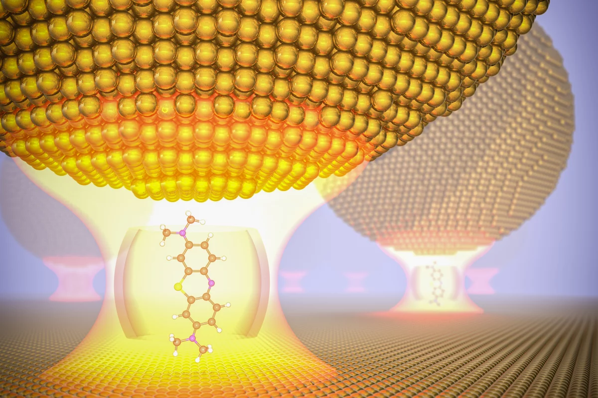 Trapped inside a tiny cavity between a gold film and a gold nanoparticle, a photon and a blue dye molecule are forced to continuously interact with each other, forming a "strong coupling" at room temperature