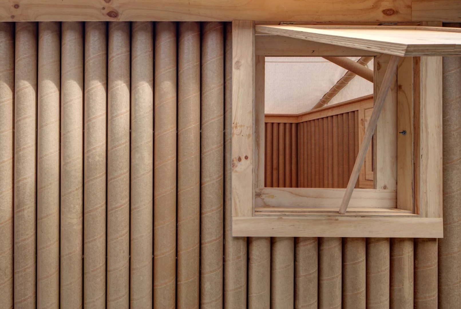 The shelter by Shigeru Ban measures 351.5 x 461.2 x 461.2 cm (138 x 181 x 181 in) and costs around US$2,000 to make