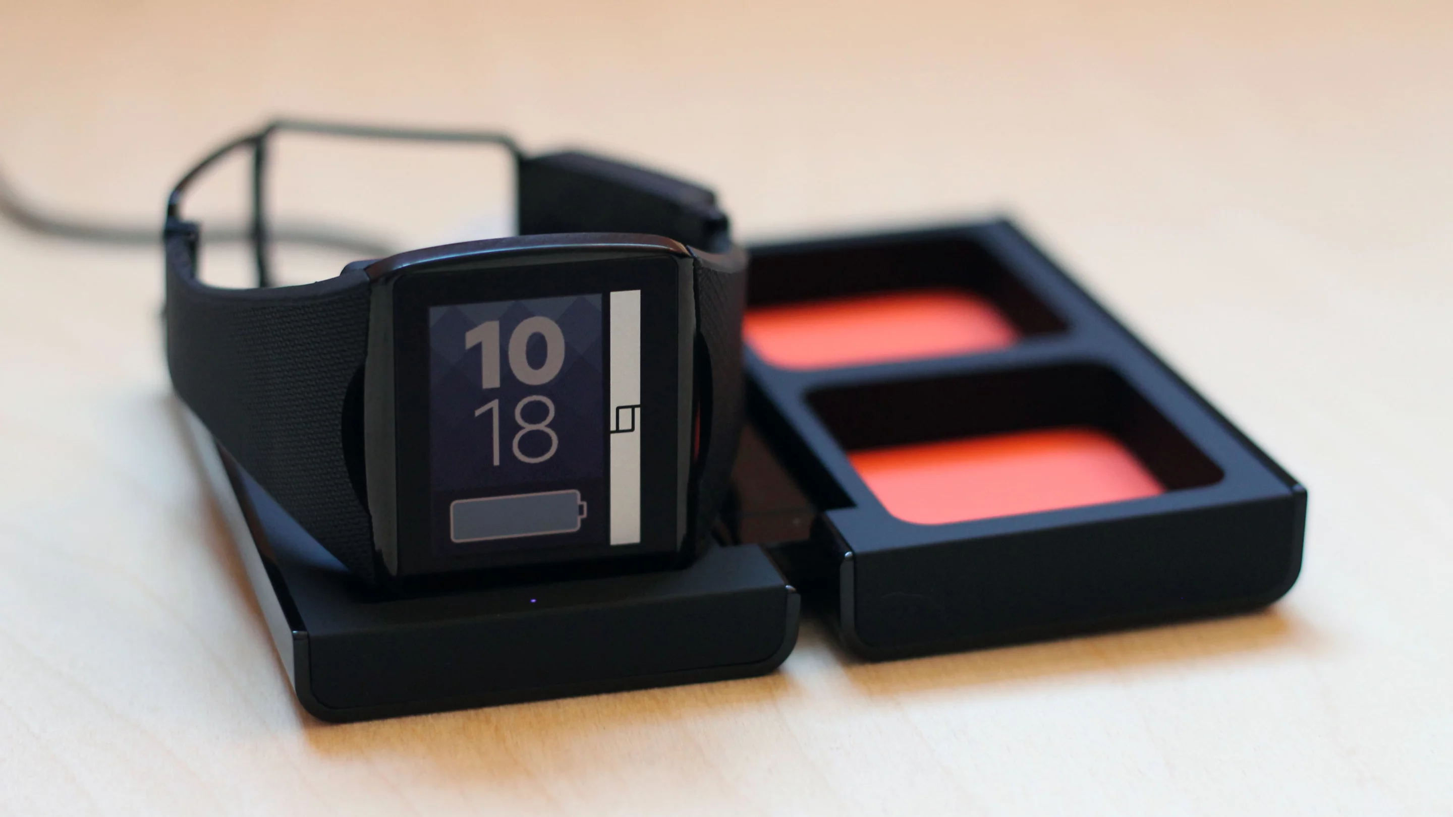 The Qualcomm Toq includes a wireless charging station