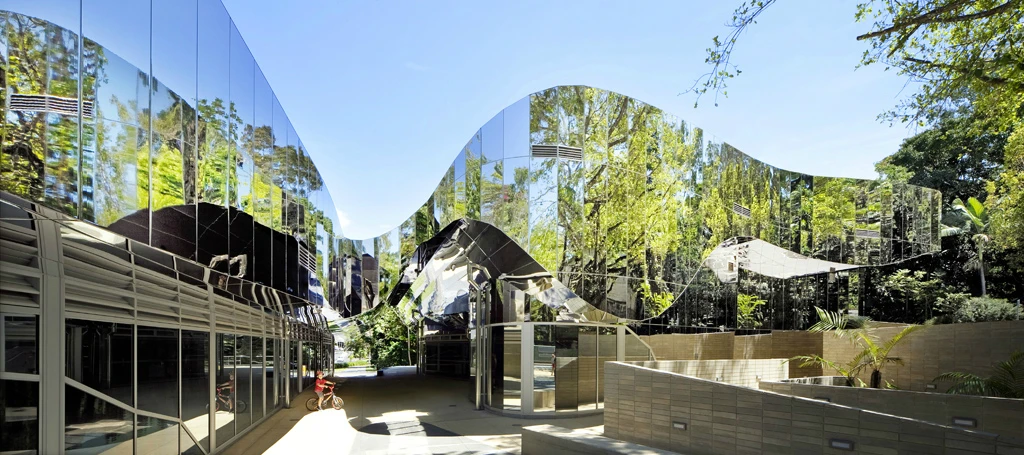 The center's sun-filled north-facing block features the information center, exhibition area, multi-purpose hall, a courtyard amphitheater, café and terrace