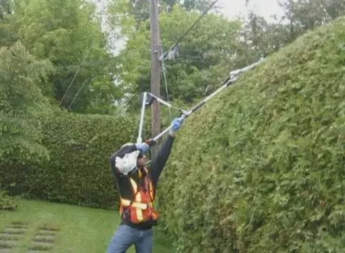 The Portable Support Tool Balancer transfers weight from the user's arms and shoulders to their torso