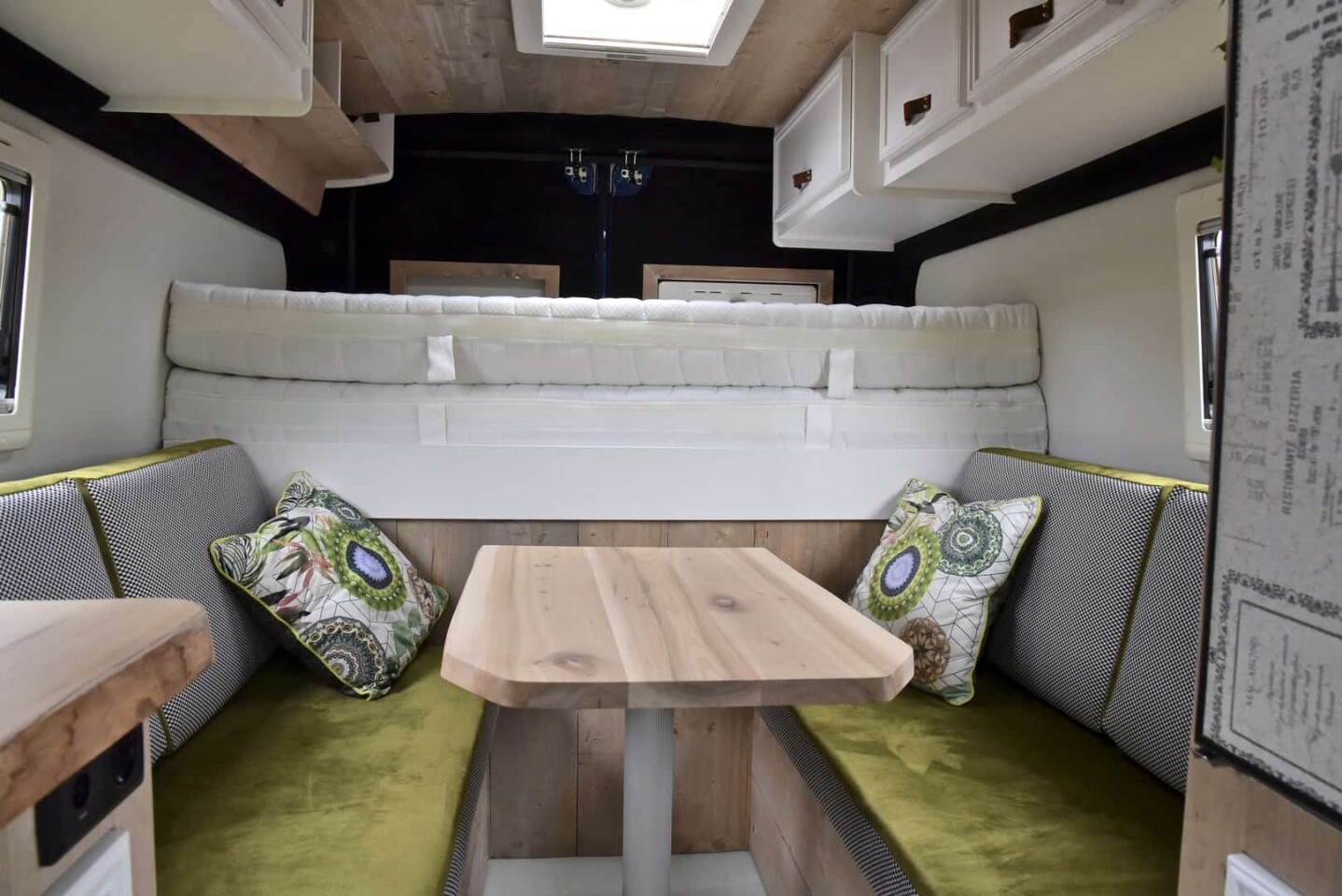 This van doesn't rely on the swivel front seats for dining and has a complete dinette set