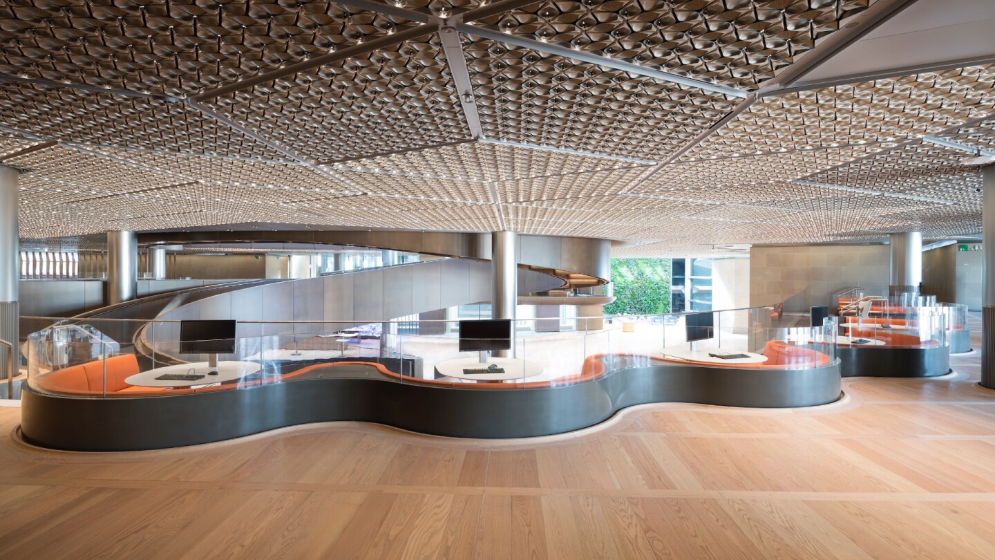 Bloomberg London's workspaces offer ergonomic electrically-operated adjustable work desks