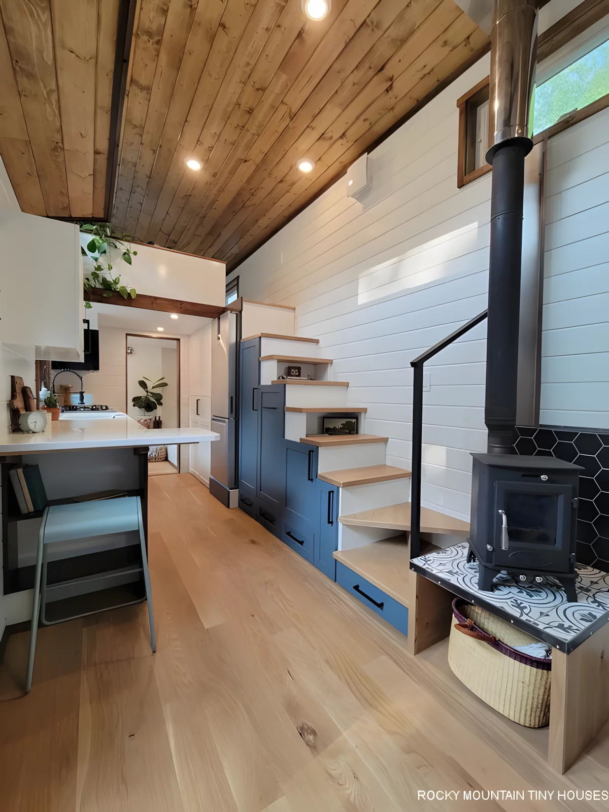 The Bandelier's bedroom is reached by storage-integrated staircase