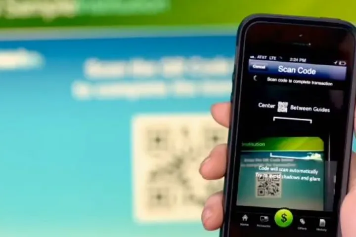 Users of the system get a QR code sent to their phone, which they scan at the ATM
